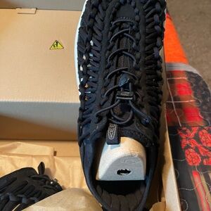 Brand new Keen tennis shoes, black with white soles